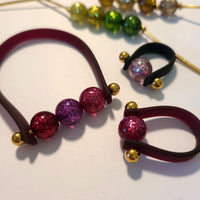 1010 - Glitter prune - Perles Polaris rondes 10mm